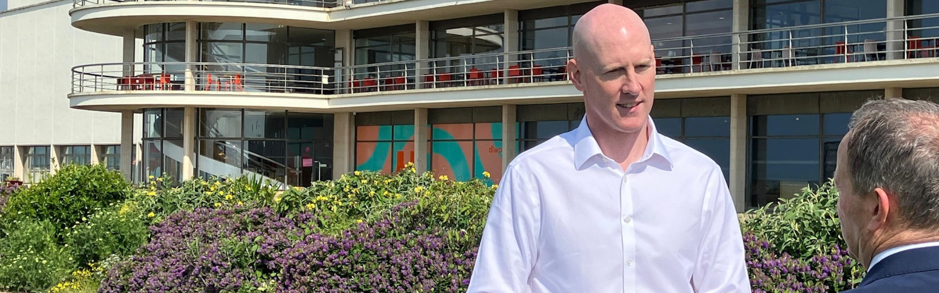 Photo of Kieran outside the De La Warr Pavilion in Bexhill