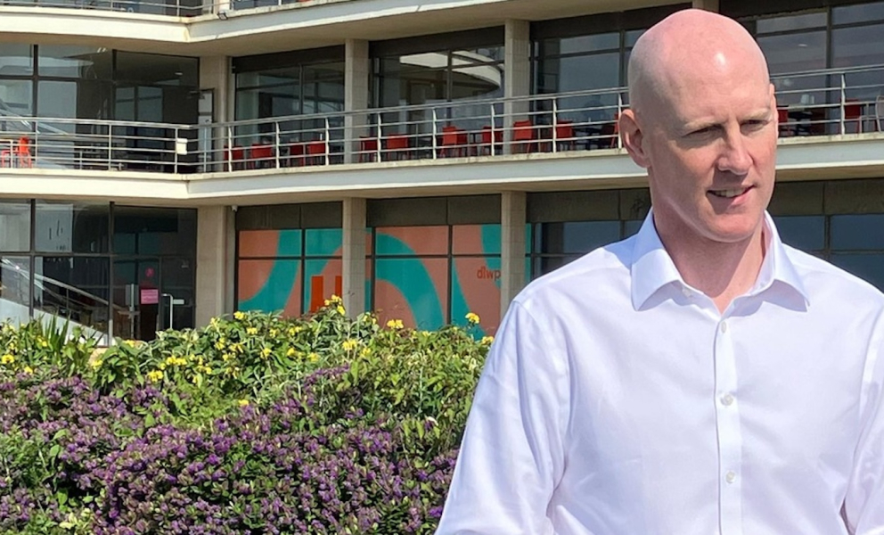 Photo of Kieran outside the De La Warr Pavilion in Bexhill