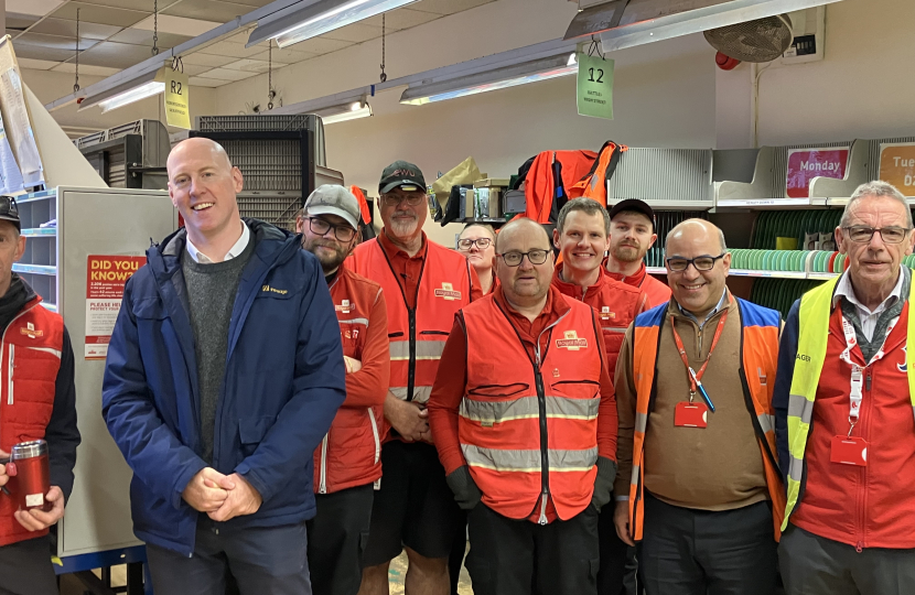 Kieran with posties at Battle Delivery Office