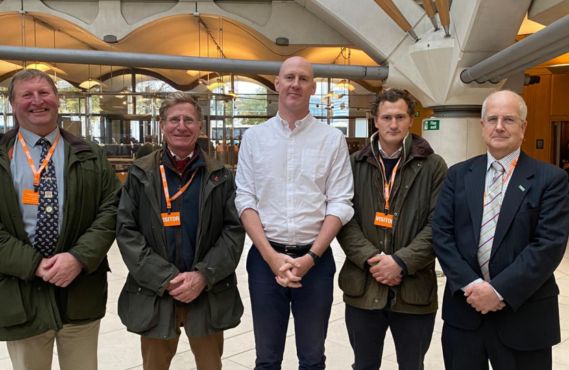 Kieran with local farmers in Parliament