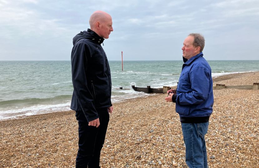 Kieran talking to local councillor on Bexhill beach