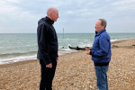 Kieran talking to local councillor on Bexhill beach