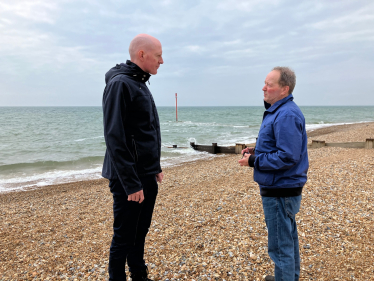 Kieran talking to local councillor on Bexhill beach